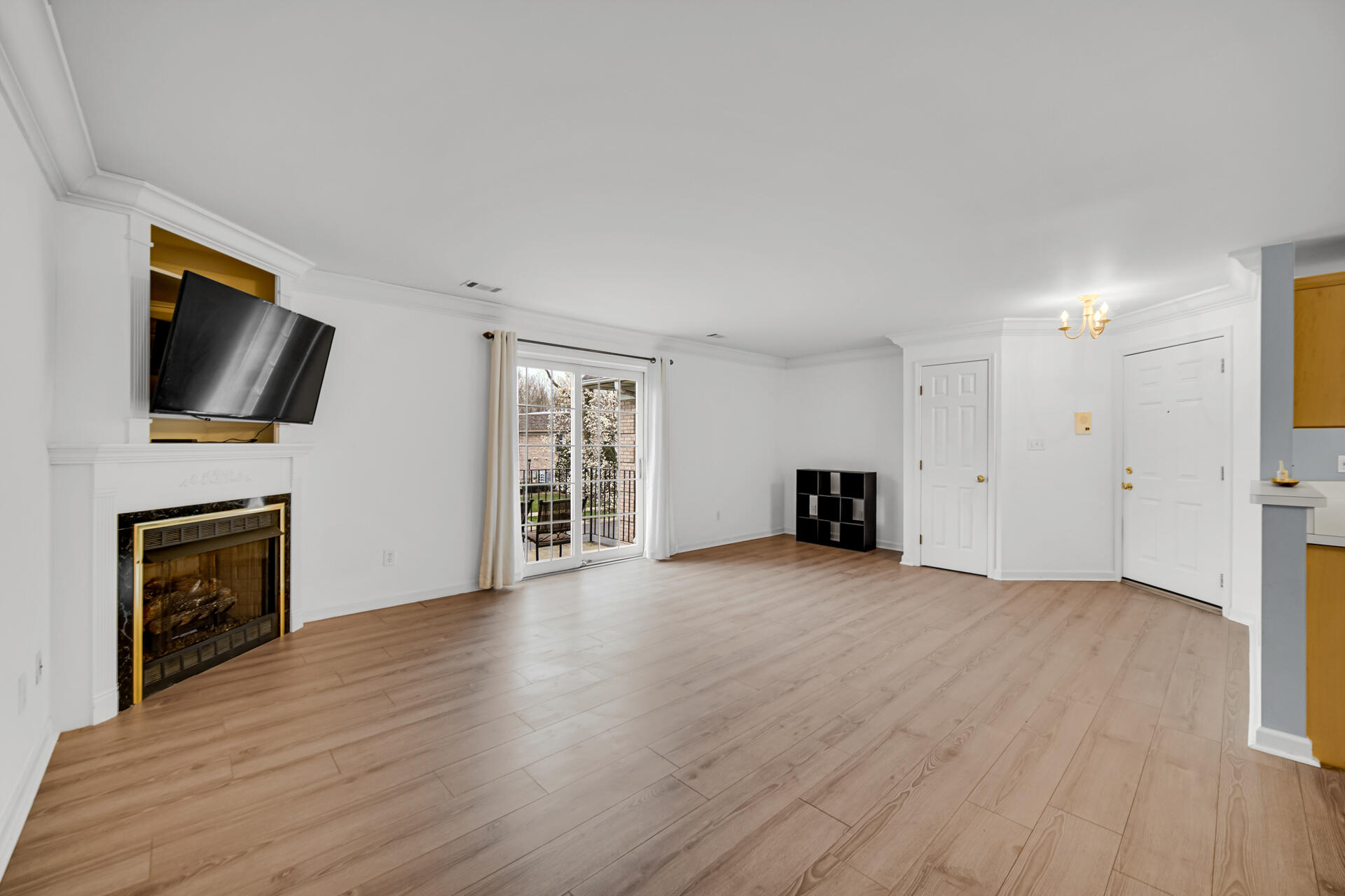 2649 Georgetowne Drive, Unit B2 Highland, IN 46322 - Photo 5 of 20 a view of a livingroom with a fireplace and a window