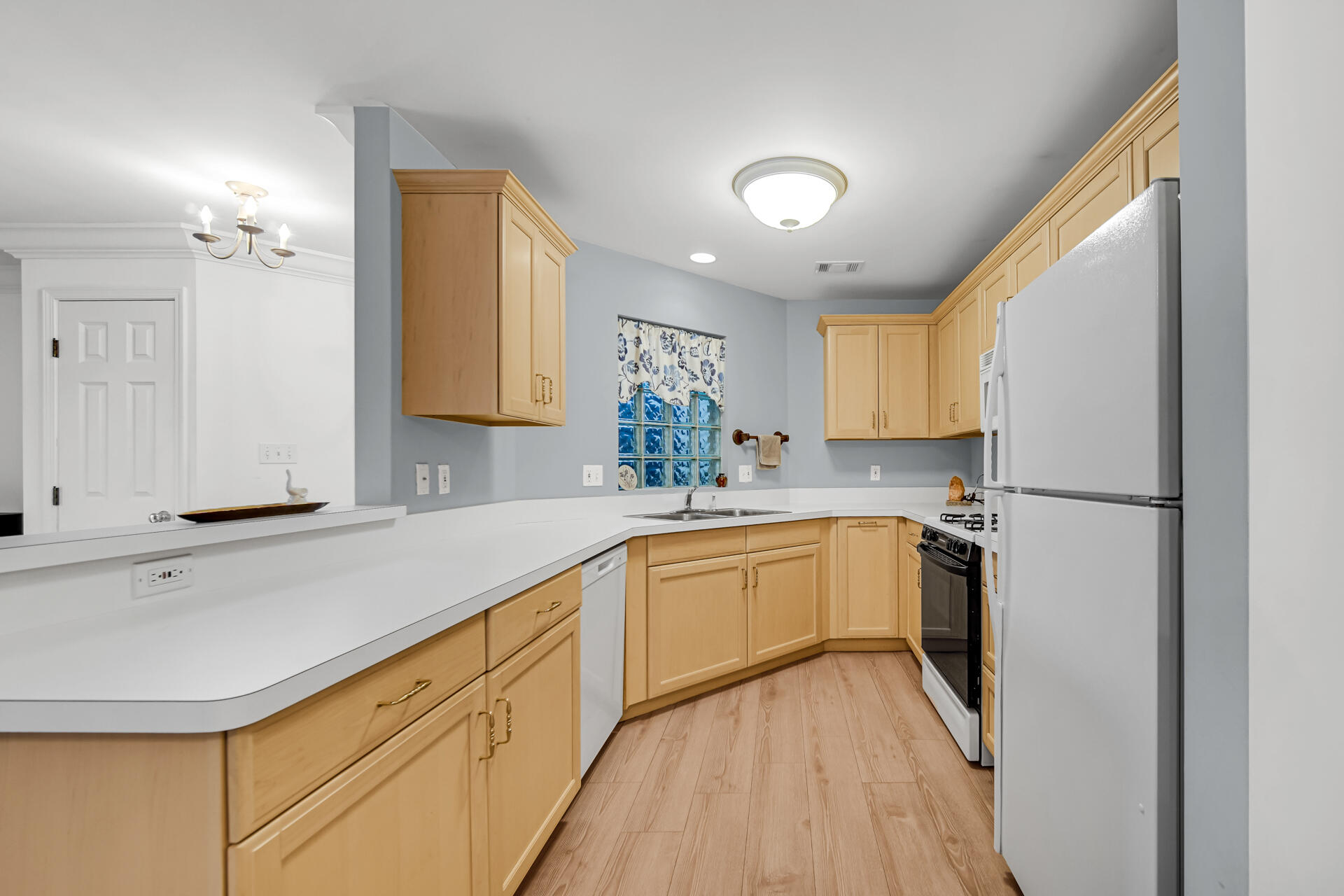 2649 Georgetowne Drive, Unit B2 Highland, IN 46322 - Photo 9 of 20 a kitchen with granite countertop a sink stainless steel appliances and cabinets