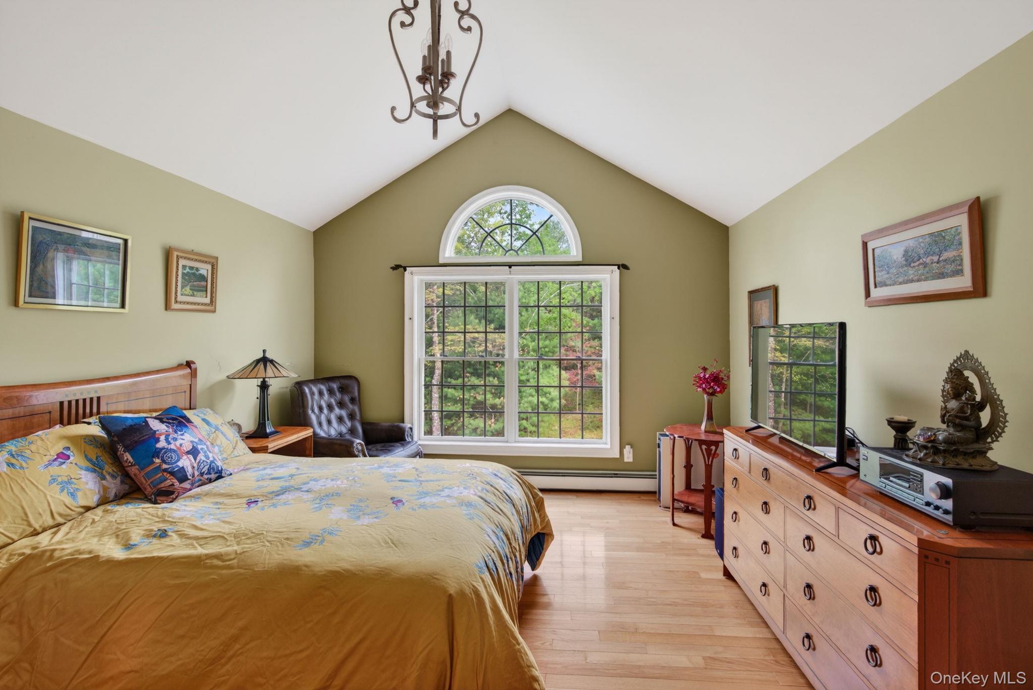 189 Bush Road Stone Ridge, NY 12484 - Photo 20 of 49 a spacious bedroom with a bed and a large window