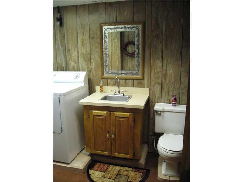 80 Ohio Street Millinocket, ME 04462 - Photo 17 of 30 Bathroom. Basement half bath and...