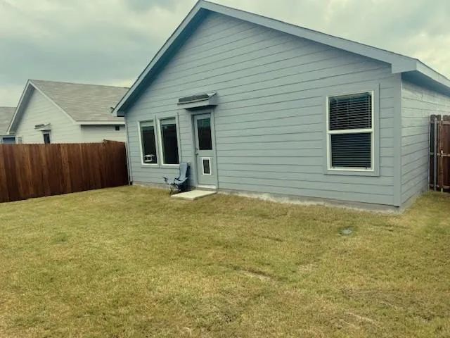 a view of a swimming pool and an outdoor seating