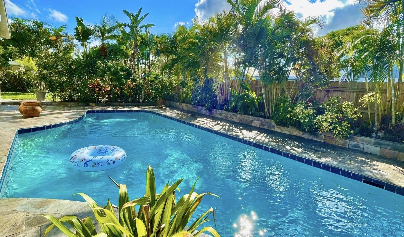 1259 Denlow Lane Royal Palm Beach, FL 33411 - Photo 2 of 40 a view of an outdoor space and swimming pool