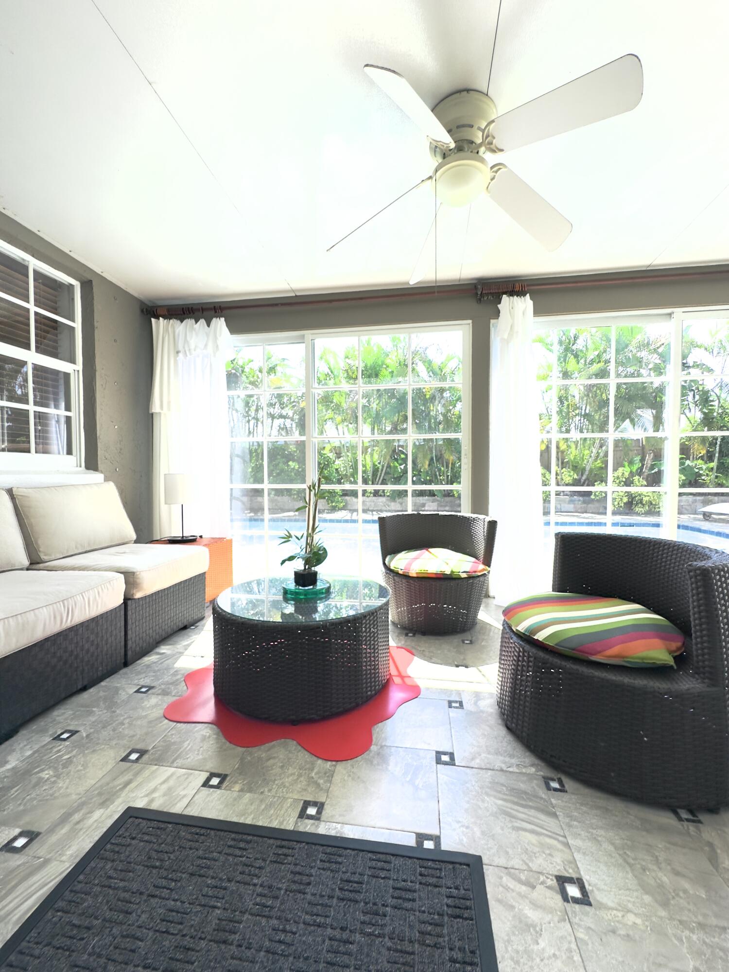 1259 Denlow Lane Royal Palm Beach, FL 33411 - Photo 34 of 40 a living room with furniture and a large window