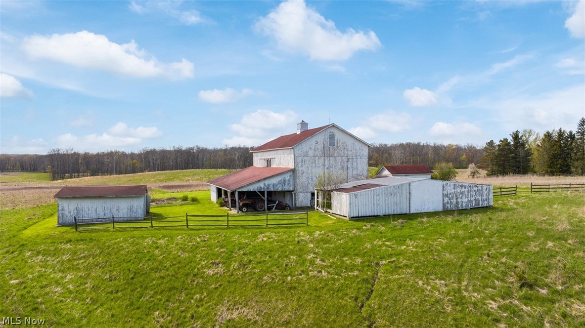 17286 Ridge Road North Royalton, OH 44133 - Photo 21 of 43 View of yard featuring an outdoor structure and a rural view