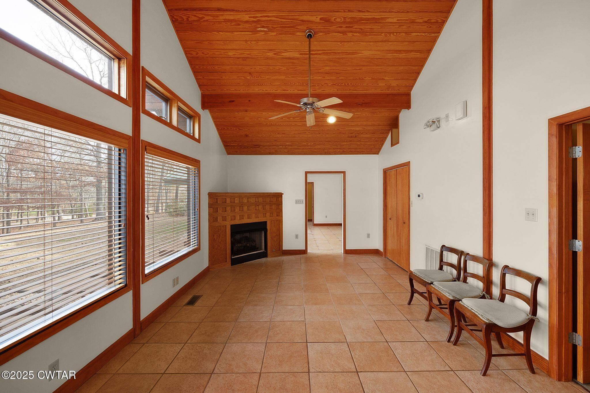 1273 Palmer Road Lexington, TN 38351 - Photo 24 of 62 a view of an empty room with wooden floor and a window
