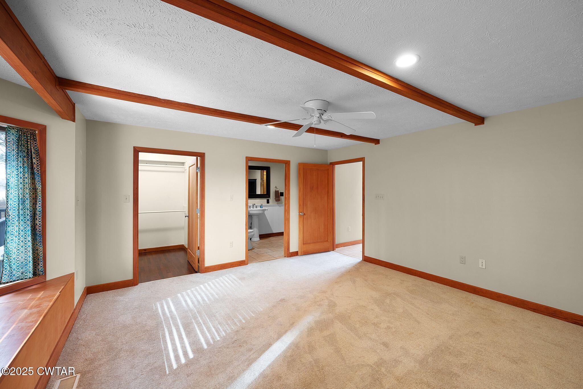 1273 Palmer Road Lexington, TN 38351 - Photo 27 of 62 a view of a big room with closet and wooden floor