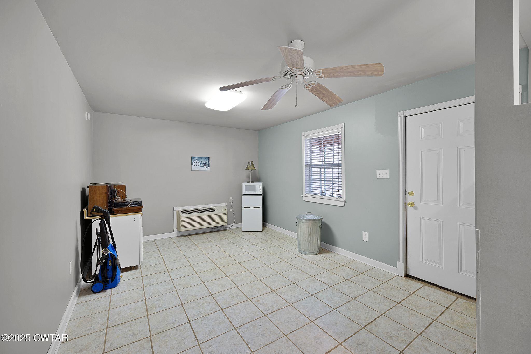 1273 Palmer Road Lexington, TN 38351 - Photo 30 of 62 a view of a livingroom with furniture and a window