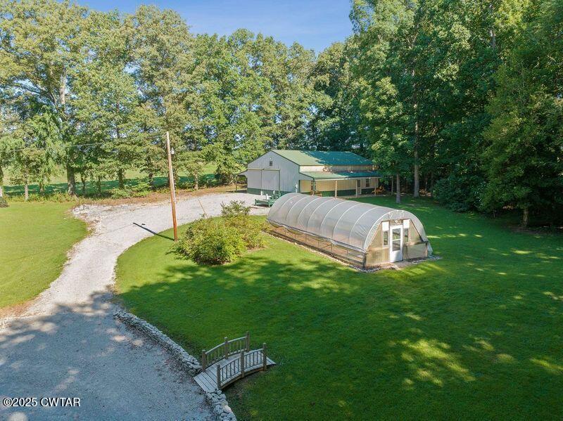 1273 Palmer Road Lexington, TN 38351 - Photo 4 of 62 a view of a backyard with a garden