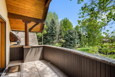 a balcony view with an outdoor space
