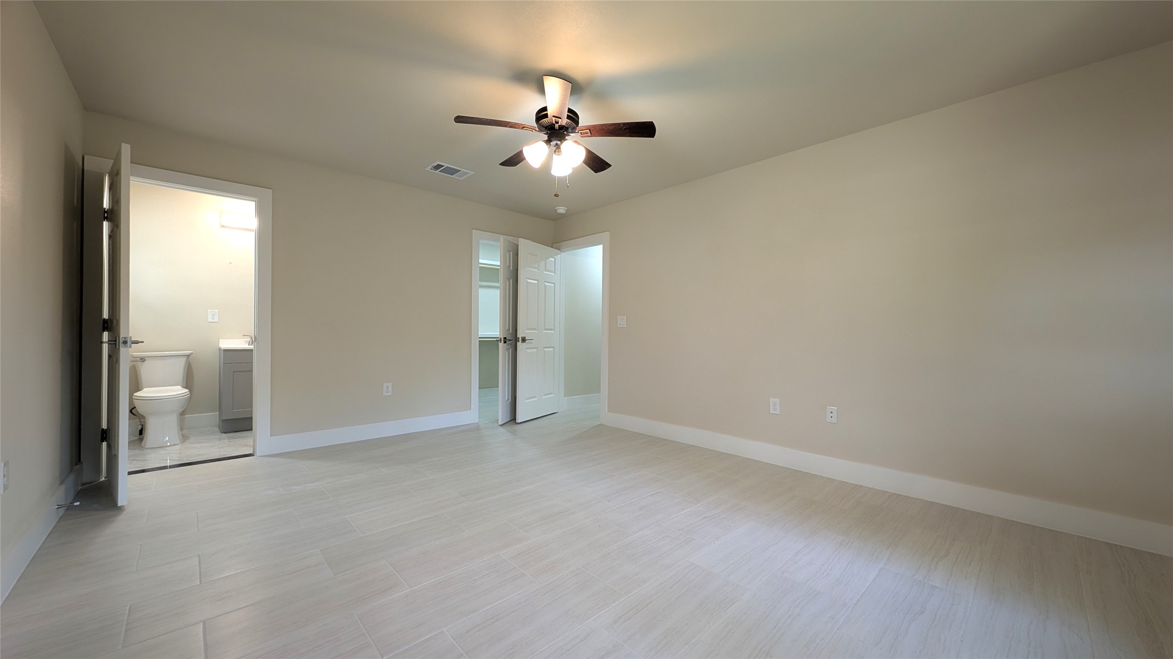 11811 Sleepy Hollow Road Manchaca, TX 78652 - Photo 14 of 31 an empty room with fan and entrance