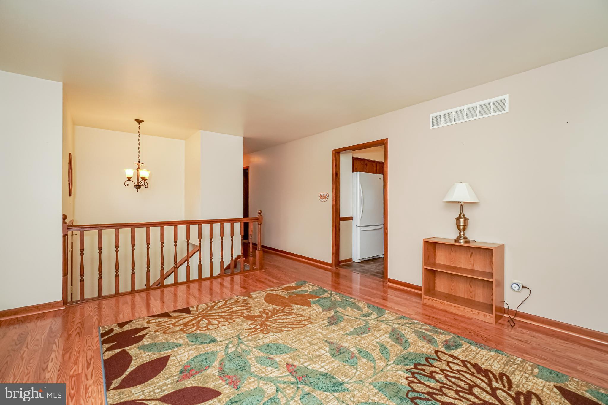 20 Riverview Court Elkton, MD 21921 - Photo 4 of 19 Family room. New laminate floors.