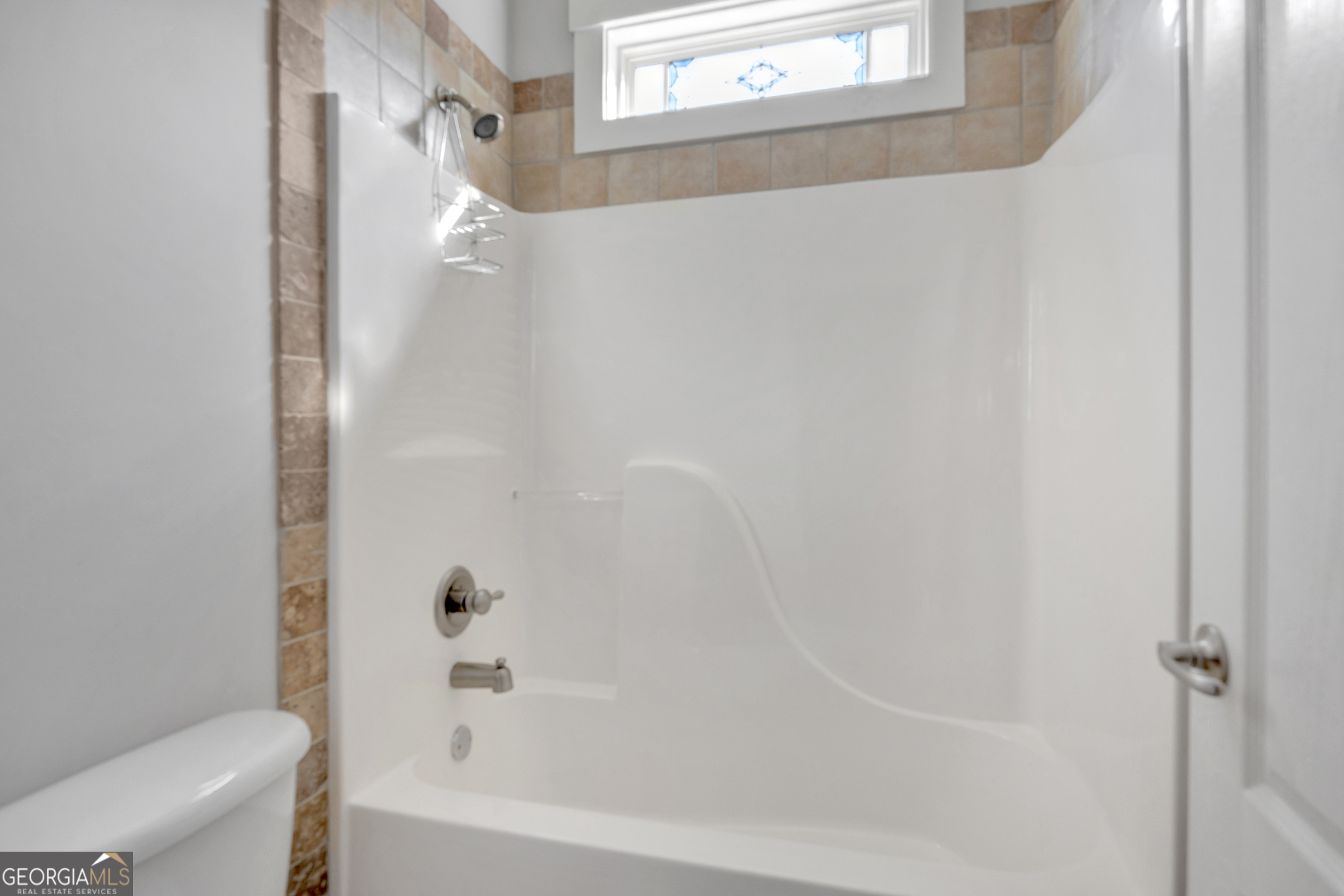 205 Ryan Lane Covington, GA 30014 - Photo 26 of 37 a bathroom with a bathtub