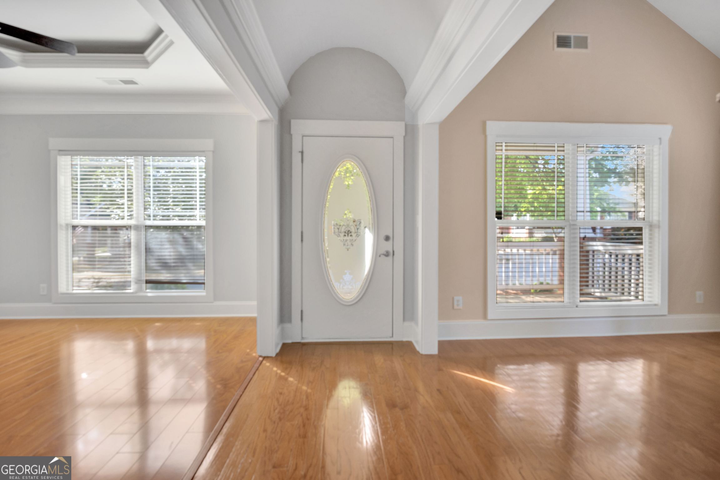 205 Ryan Lane Covington, GA 30014 - Photo 29 of 37 an empty room with wooden floor and windows