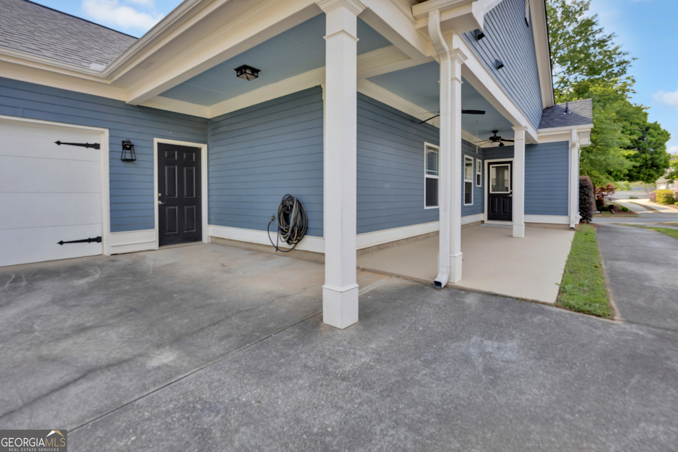 205 Ryan Lane Covington, GA 30014 - Photo 30 of 37 a view of an house with porch