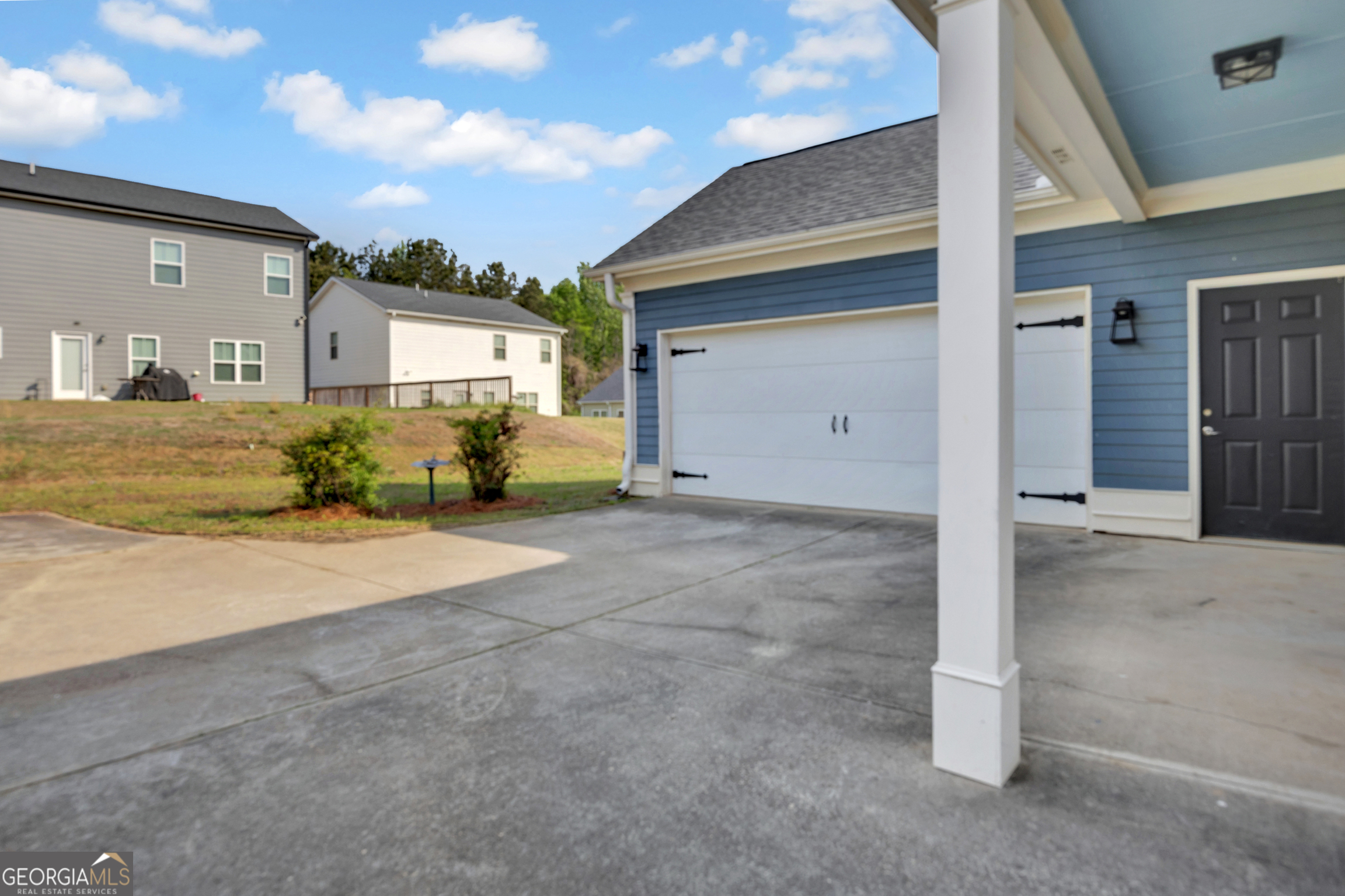 205 Ryan Lane Covington, GA 30014 - Photo 33 of 37 a view of a house with backyard space