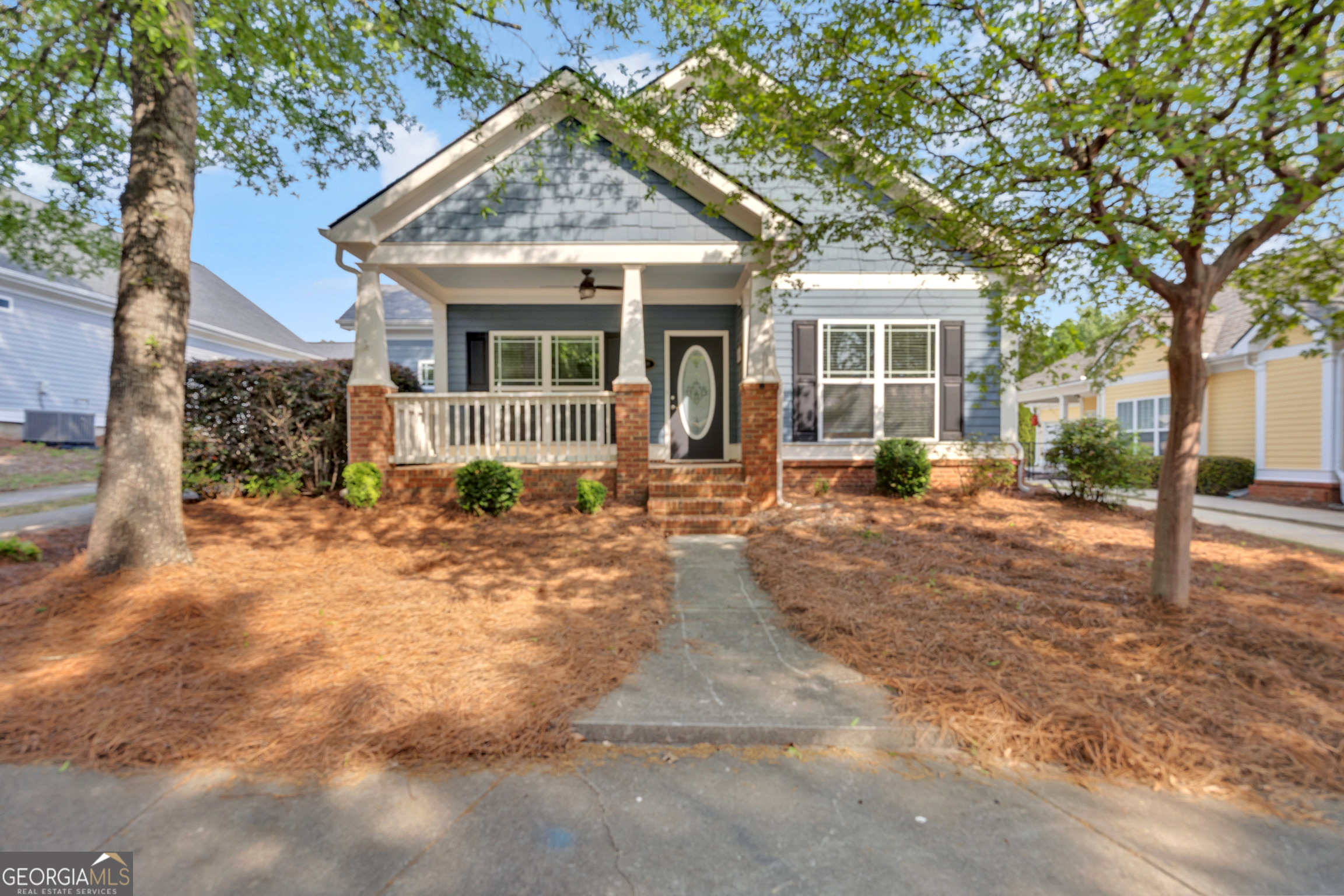 205 Ryan Lane Covington, GA 30014 - Photo 36 of 37 a front view of a house with garden