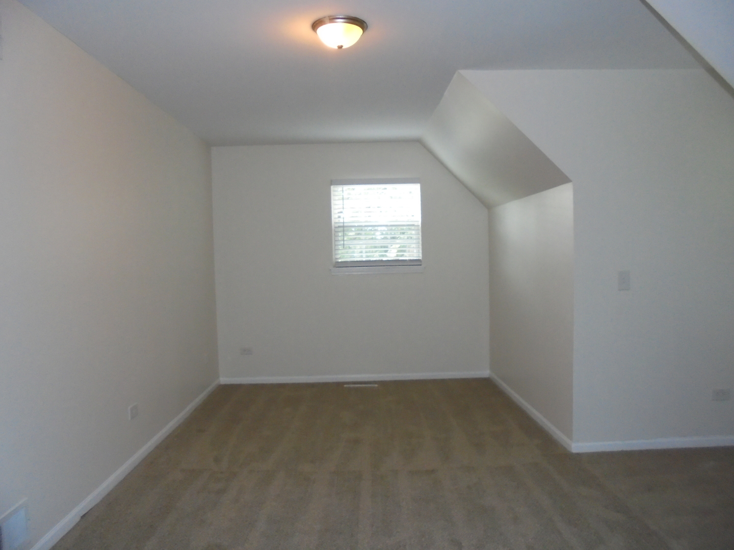 660 West Nippersink Road Round Lake, IL 60073 - Photo 22 of 24 an empty room with a window