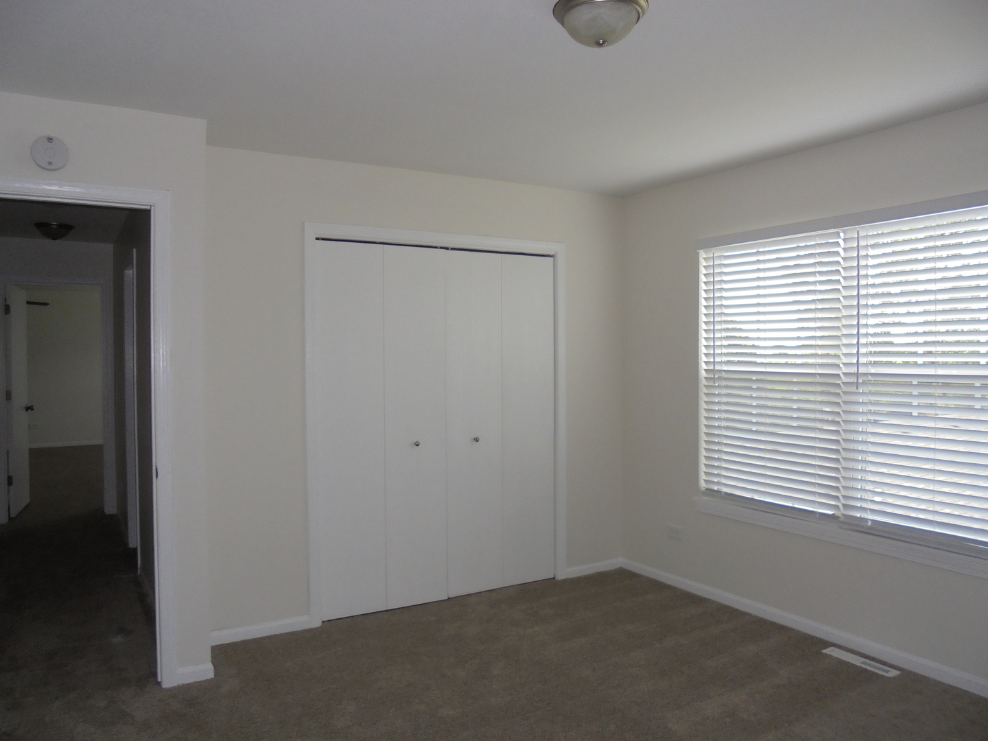 660 West Nippersink Road Round Lake, IL 60073 - Photo 24 of 24 a view of an empty room with a window