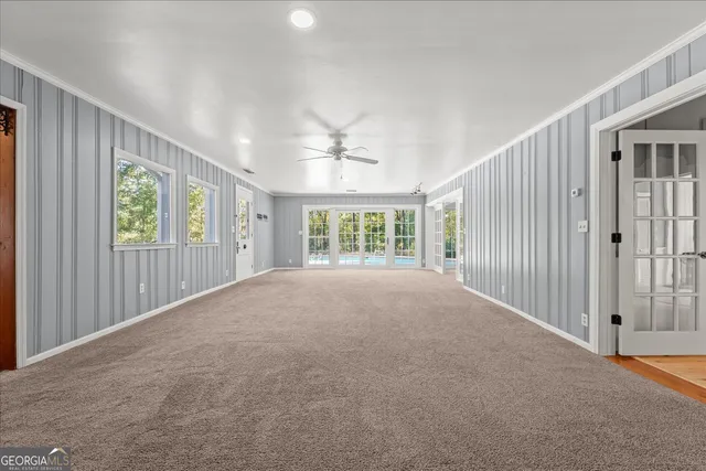 a bathroom with a sink a mirror and a shower
