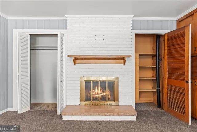 a bathroom with a sink toilet and a mirror