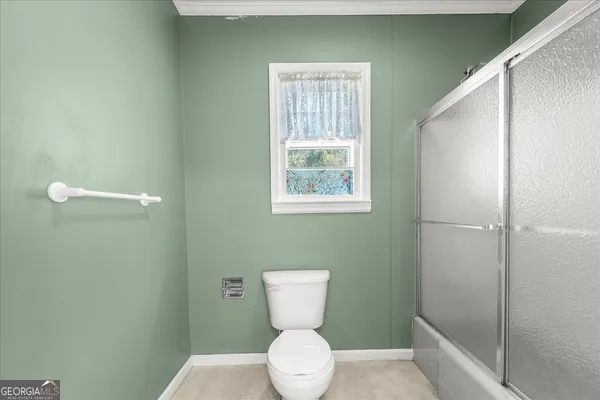 a view of a chairs and tables in the patio