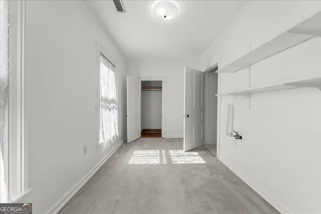 a view of outdoor space with playground and green space