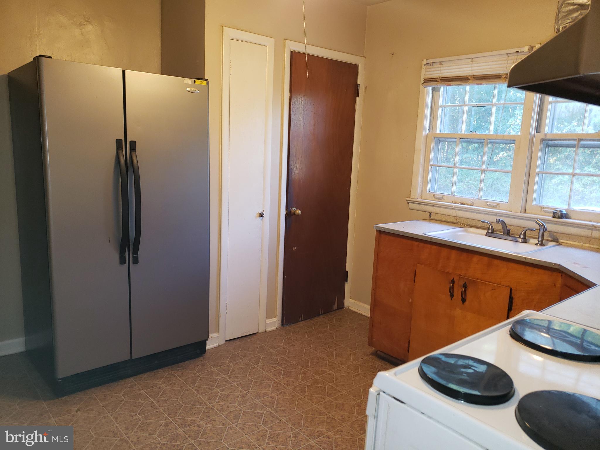 5560 Germantown Road Midland, VA 22728 - Photo 13 of 41 Kitchen w/ entrance to basement