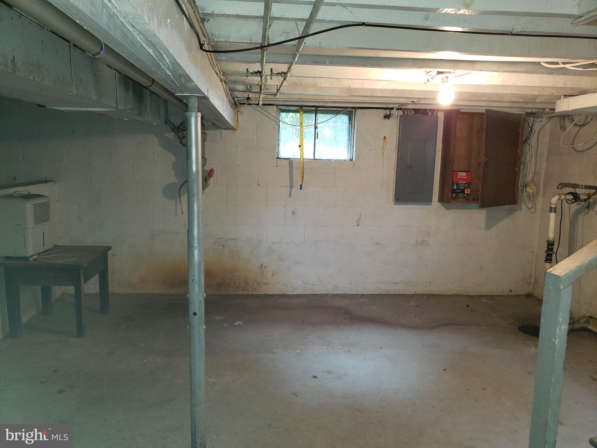 5560 Germantown Road Midland, VA 22728 - Photo 37 of 41 Basement w/ sump pump