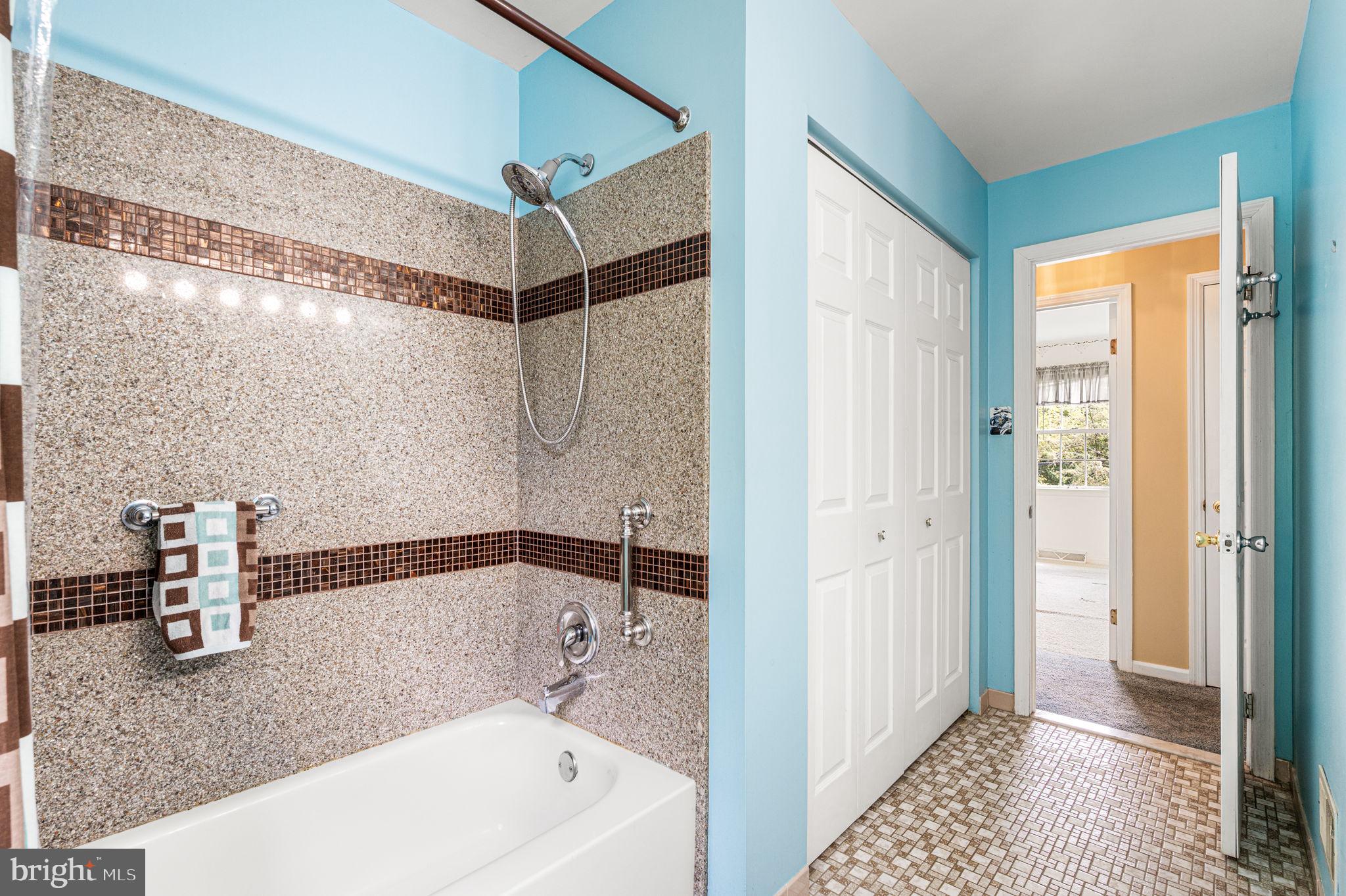 23 East Knowlton Road Media, PA 19063 - Photo 30 of 40 a bathroom with a tub and a shower