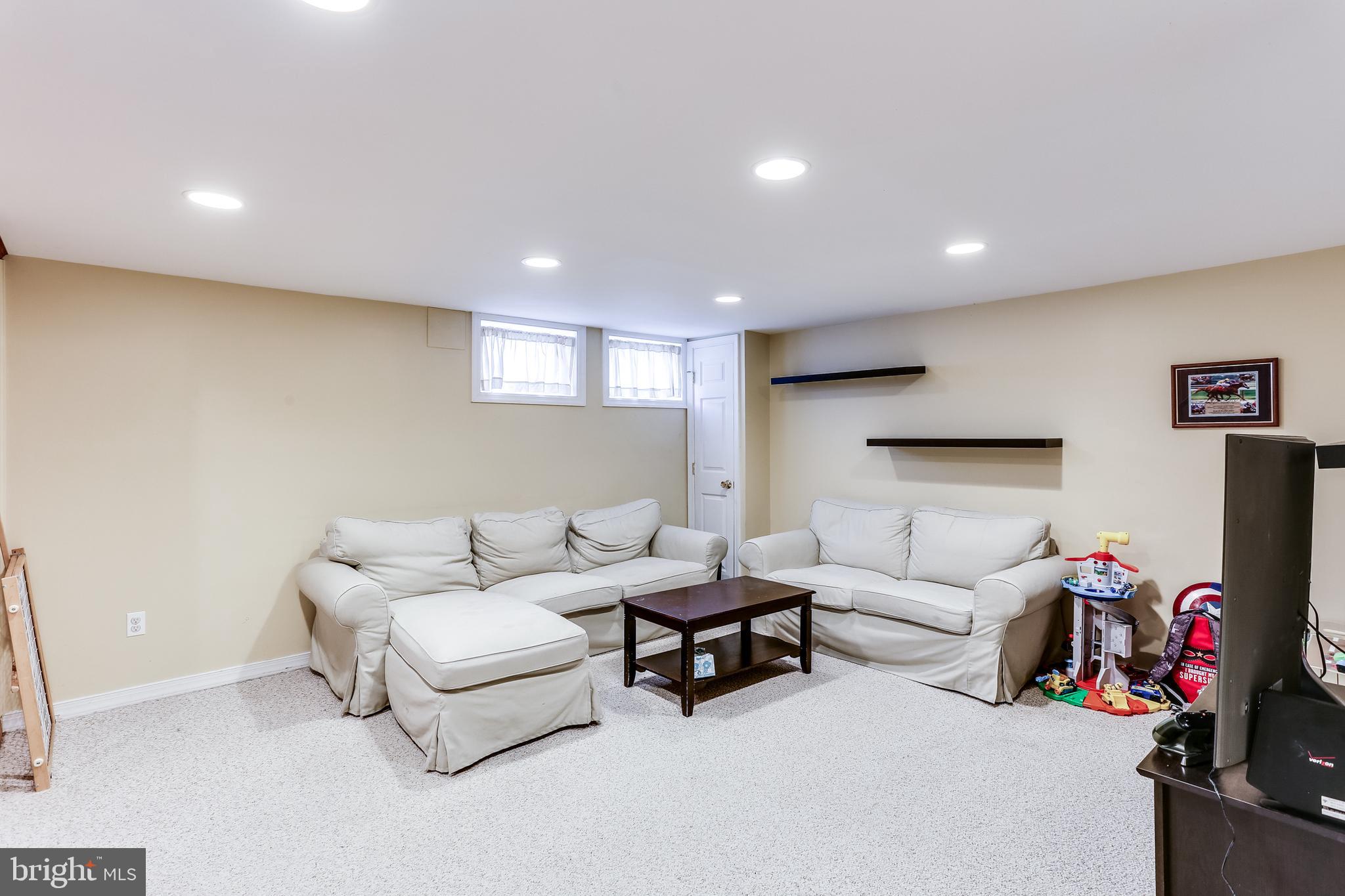 402 Stratford Road Baltimore, MD 21228 - Photo 19 of 25 Lower level Famlly Rm