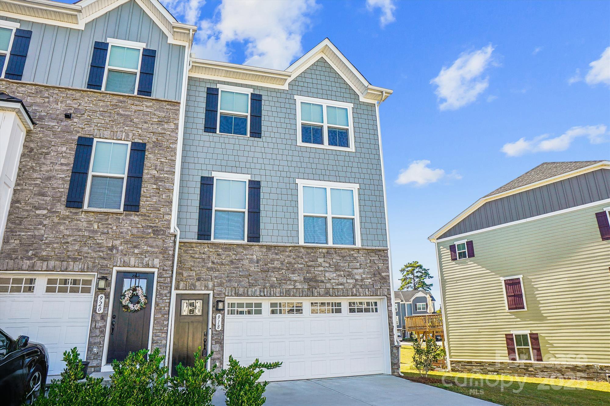 918 Portrush Lane Tega Cay, SC 29708 - Photo 2 of 36 a front view of a house with a yard