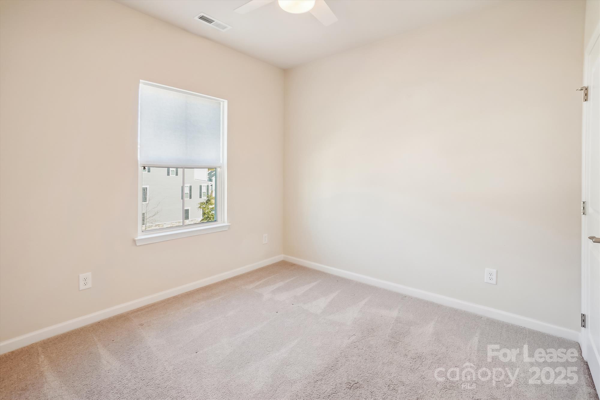 918 Portrush Lane Tega Cay, SC 29708 - Photo 21 of 36 an empty room with a window