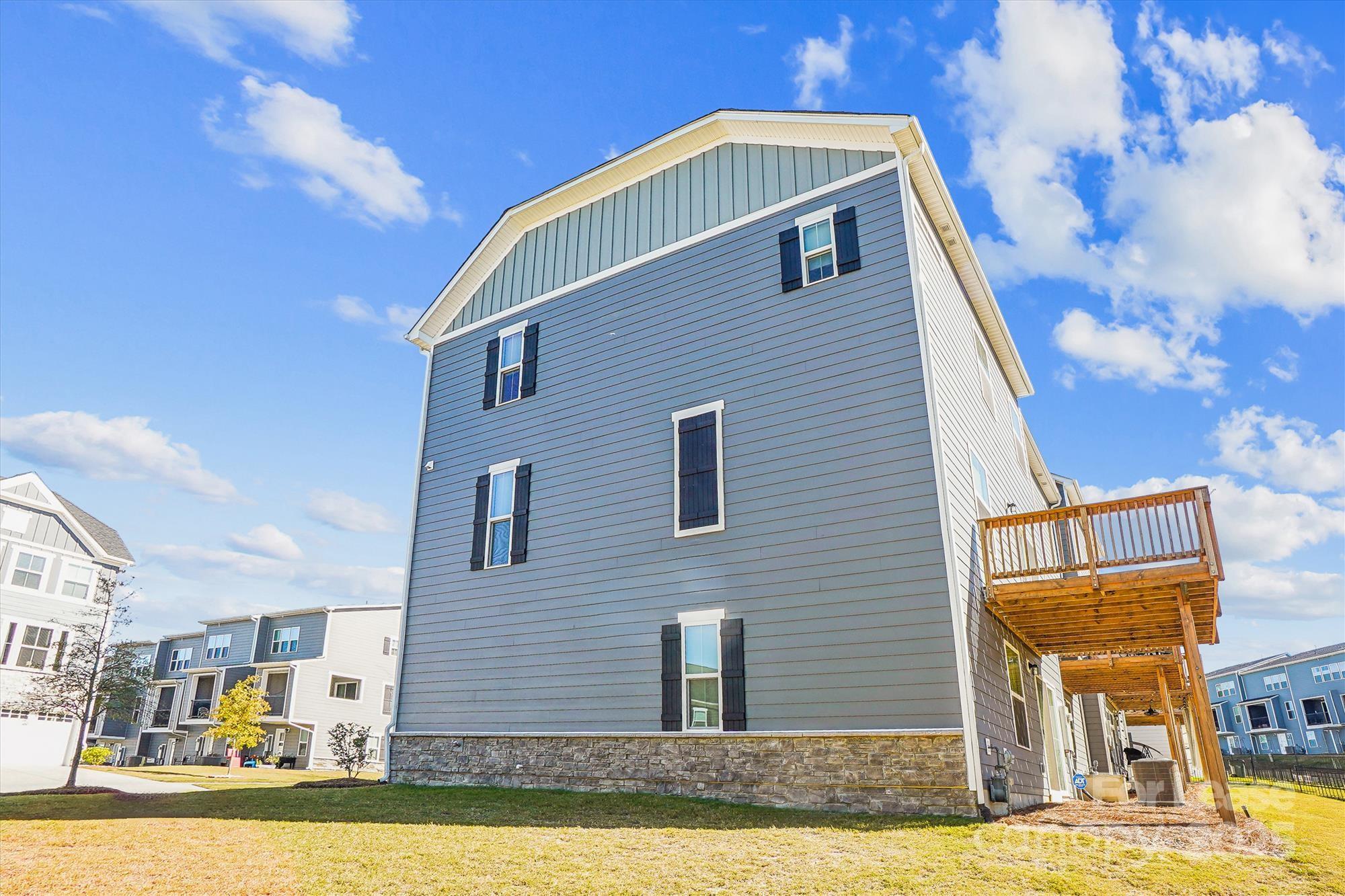 918 Portrush Lane Tega Cay, SC 29708 - Photo 3 of 36 a front view of a house with a yard