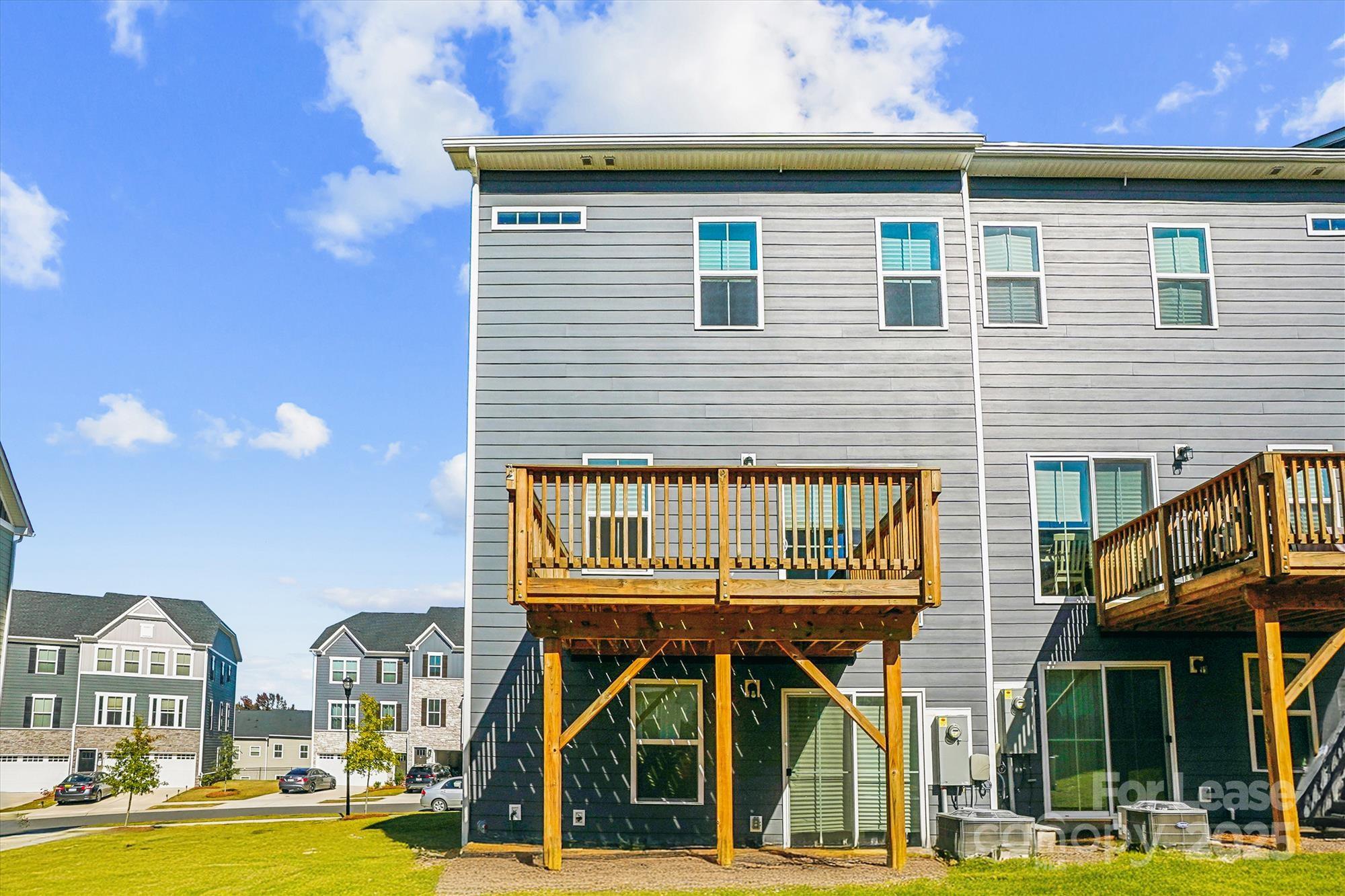 918 Portrush Lane Tega Cay, SC 29708 - Photo 34 of 36 a view of a building with street view