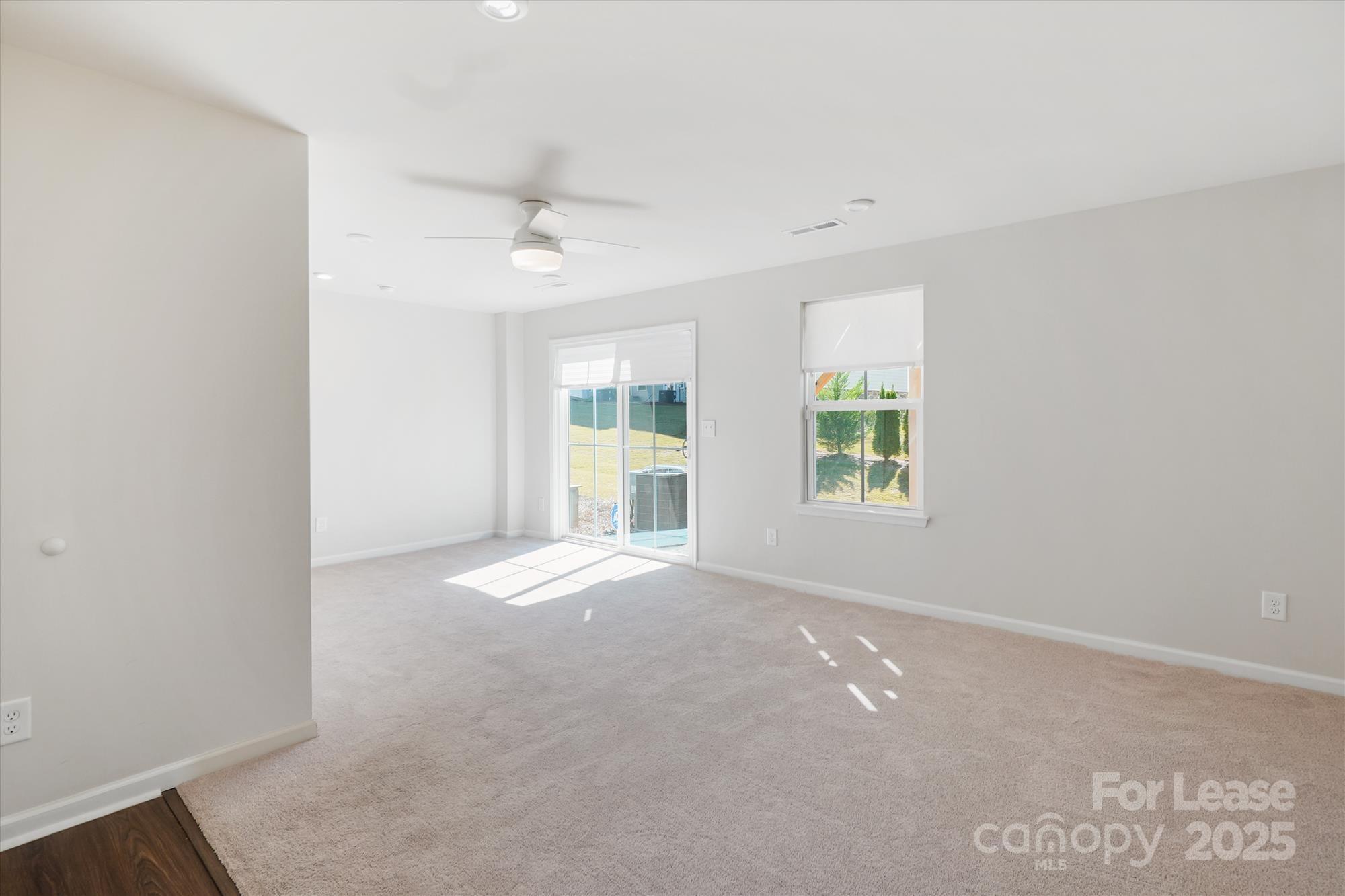 918 Portrush Lane Tega Cay, SC 29708 - Photo 7 of 36 an empty room with windows and closet