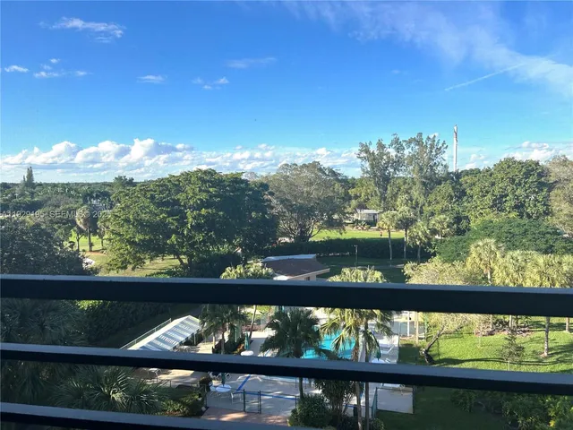 a view of a lake from a balcony