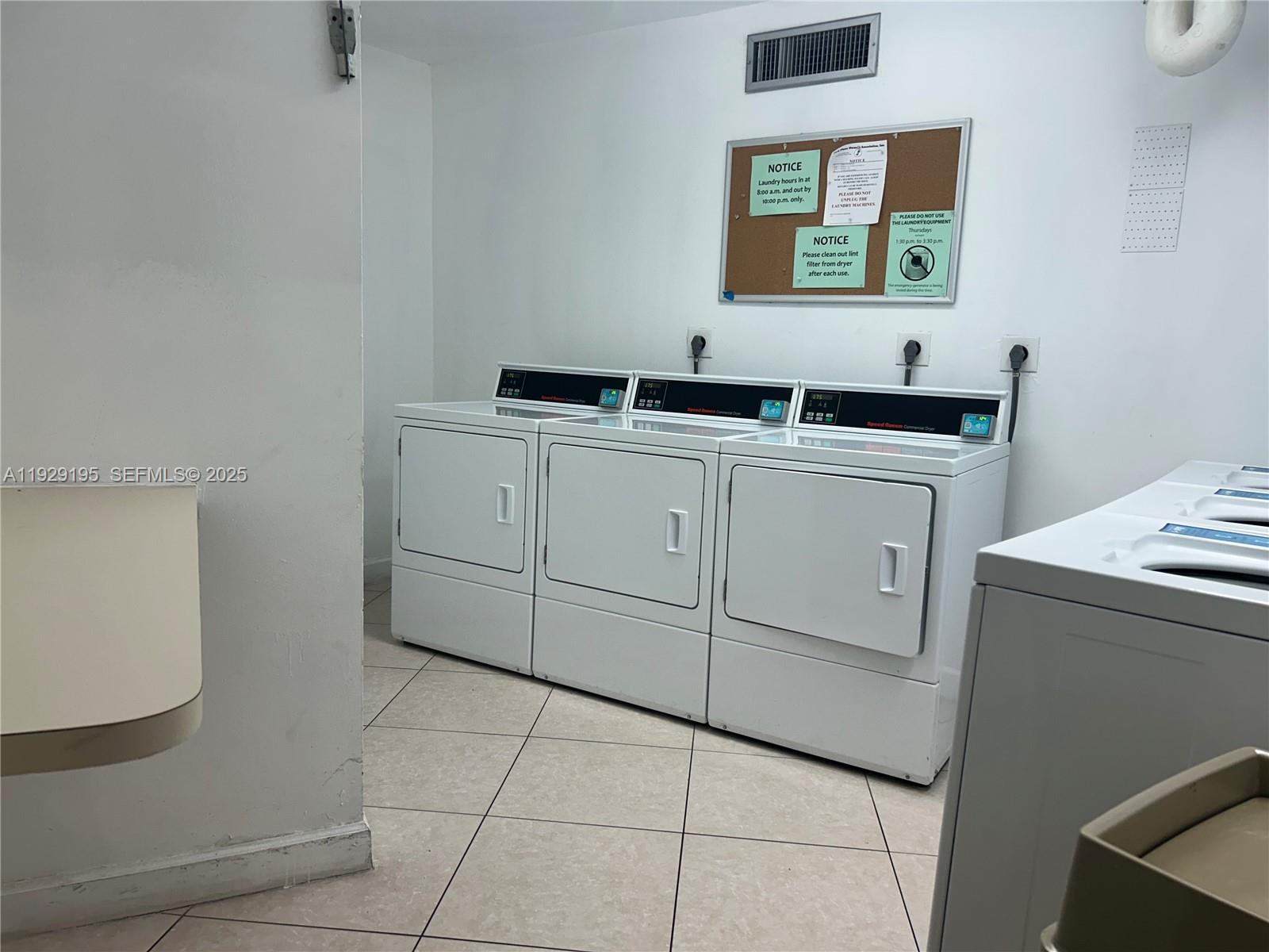 900 St Charles Place, Unit 606 Pembroke Pines, FL 33026 - Photo 23 of 36 a view of cabinets and window