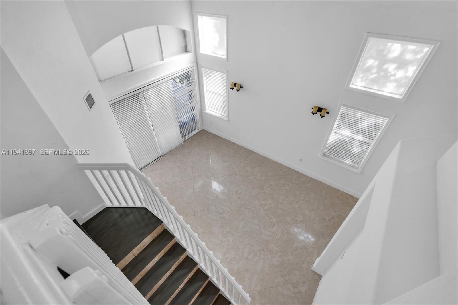 5505 Northwest 112th Path, Unit 5505 Doral, FL 33178 - Photo 20 of 44 a view of an entryway and livingroom