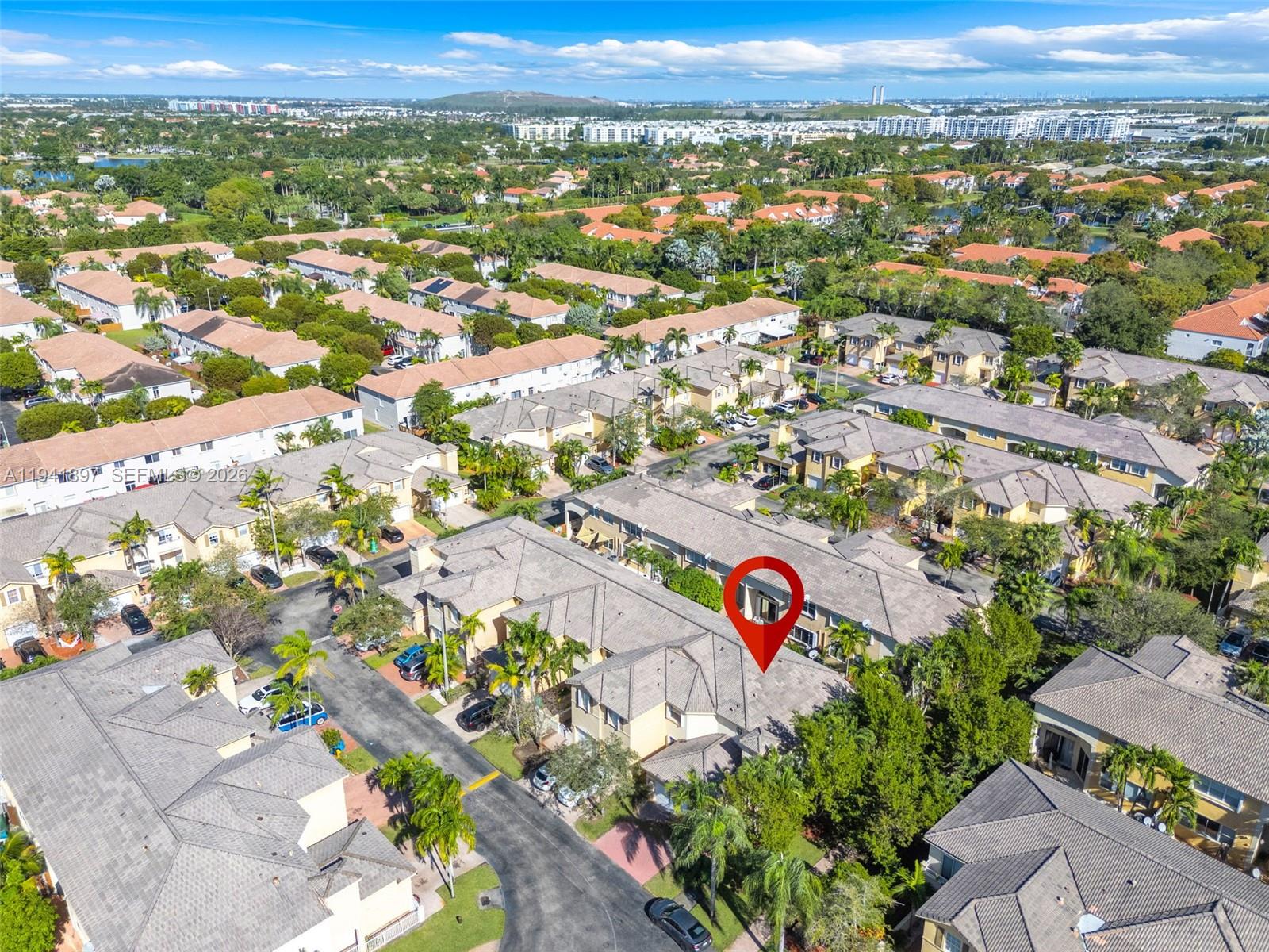 5505 Northwest 112th Path, Unit 5505 Doral, FL 33178 - Photo 37 of 44 an aerial view of a city