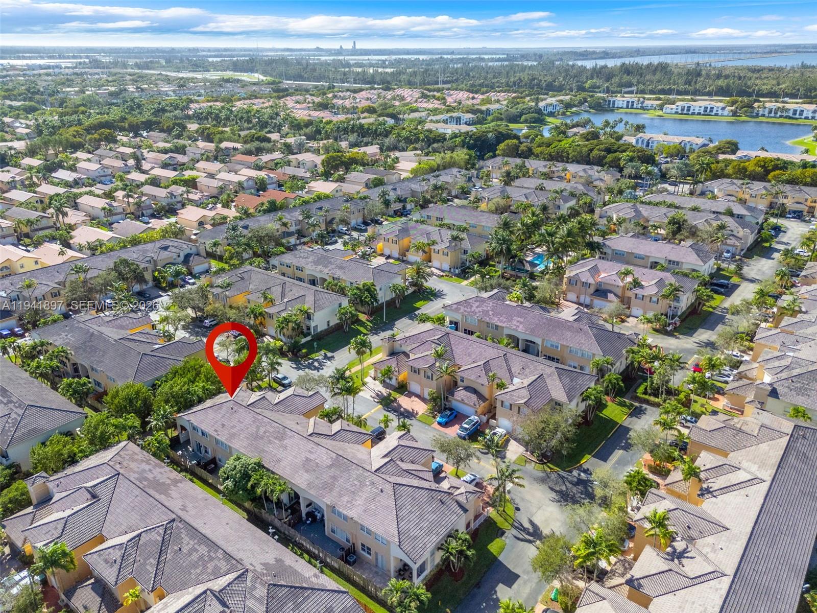 5505 Northwest 112th Path, Unit 5505 Doral, FL 33178 - Photo 40 of 44 an aerial view of multiple house