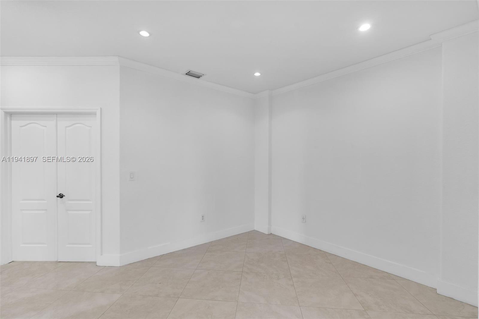 5505 Northwest 112th Path, Unit 5505 Doral, FL 33178 - Photo 10 of 44 a view of an empty room