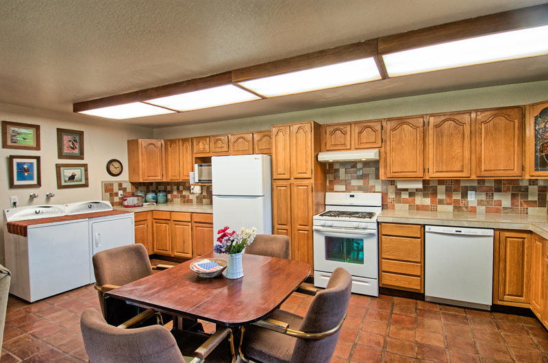9375 Thatcher Mill Road Shingletown, CA 96088 - Photo 6 of 23 a open kitchen with stainless steel appliances granite countertop a stove and a refrigerator