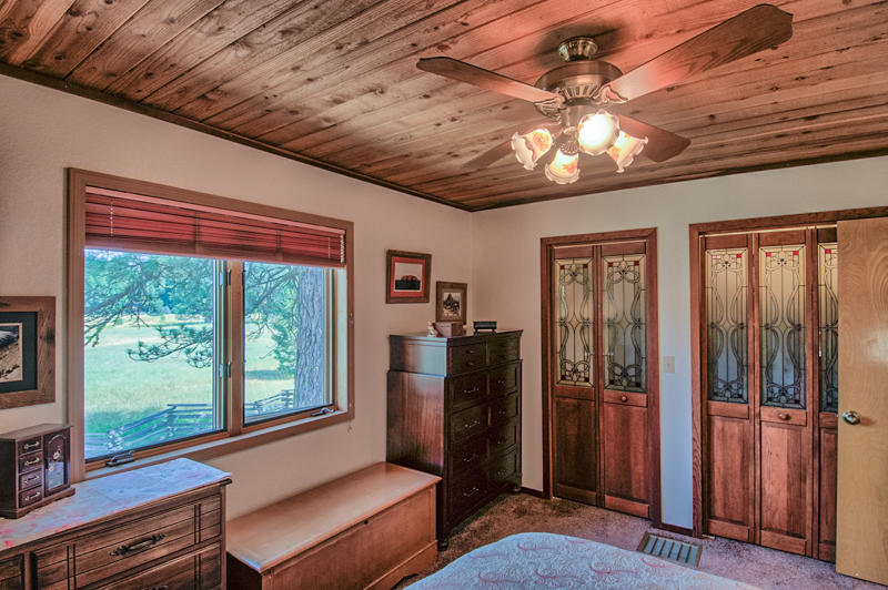 9375 Thatcher Mill Road Shingletown, CA 96088 - Photo 8 of 23 a view of a livingroom with furniture and windows