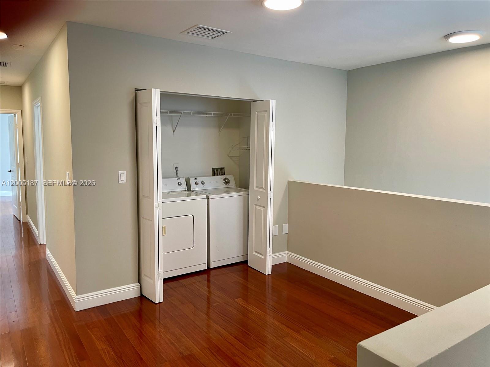3191 Ohio Street Miami, FL 33133 - Photo 14 of 32 a view of a kitchen with wooden floor and electronic appliances