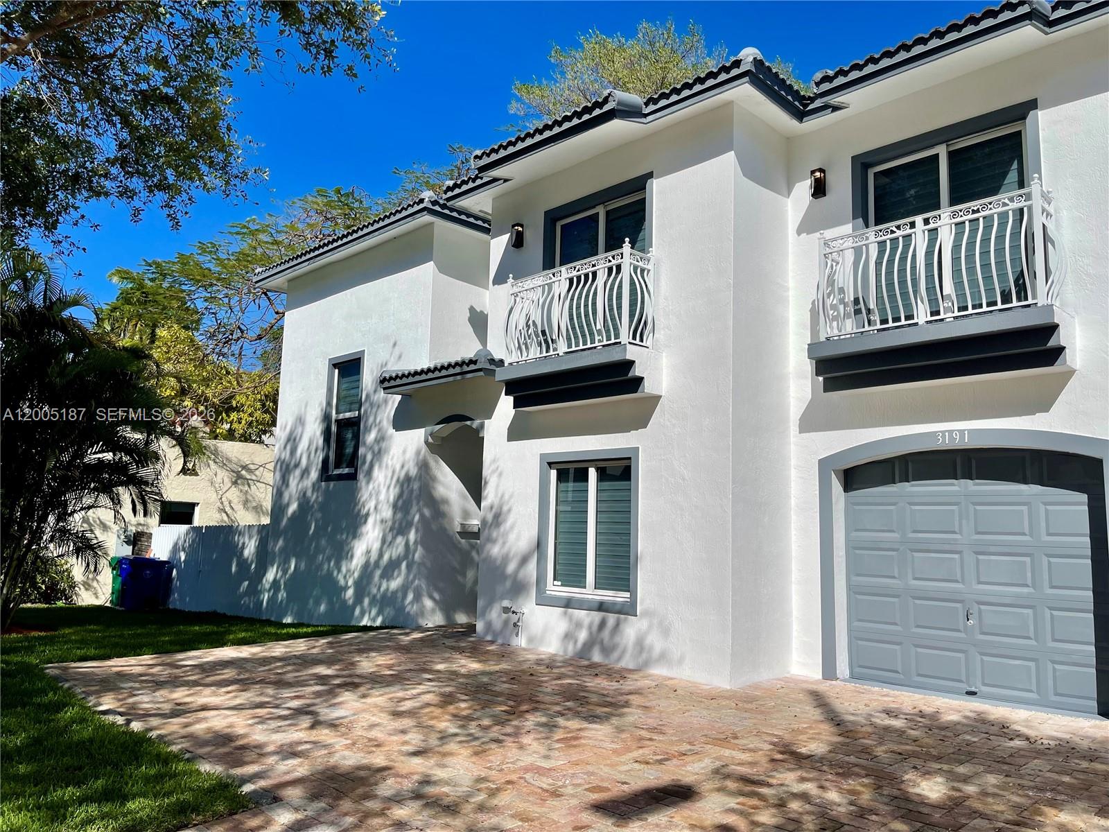 3191 Ohio Street Miami, FL 33133 - Photo 32 of 32 a front view of a house with a yard