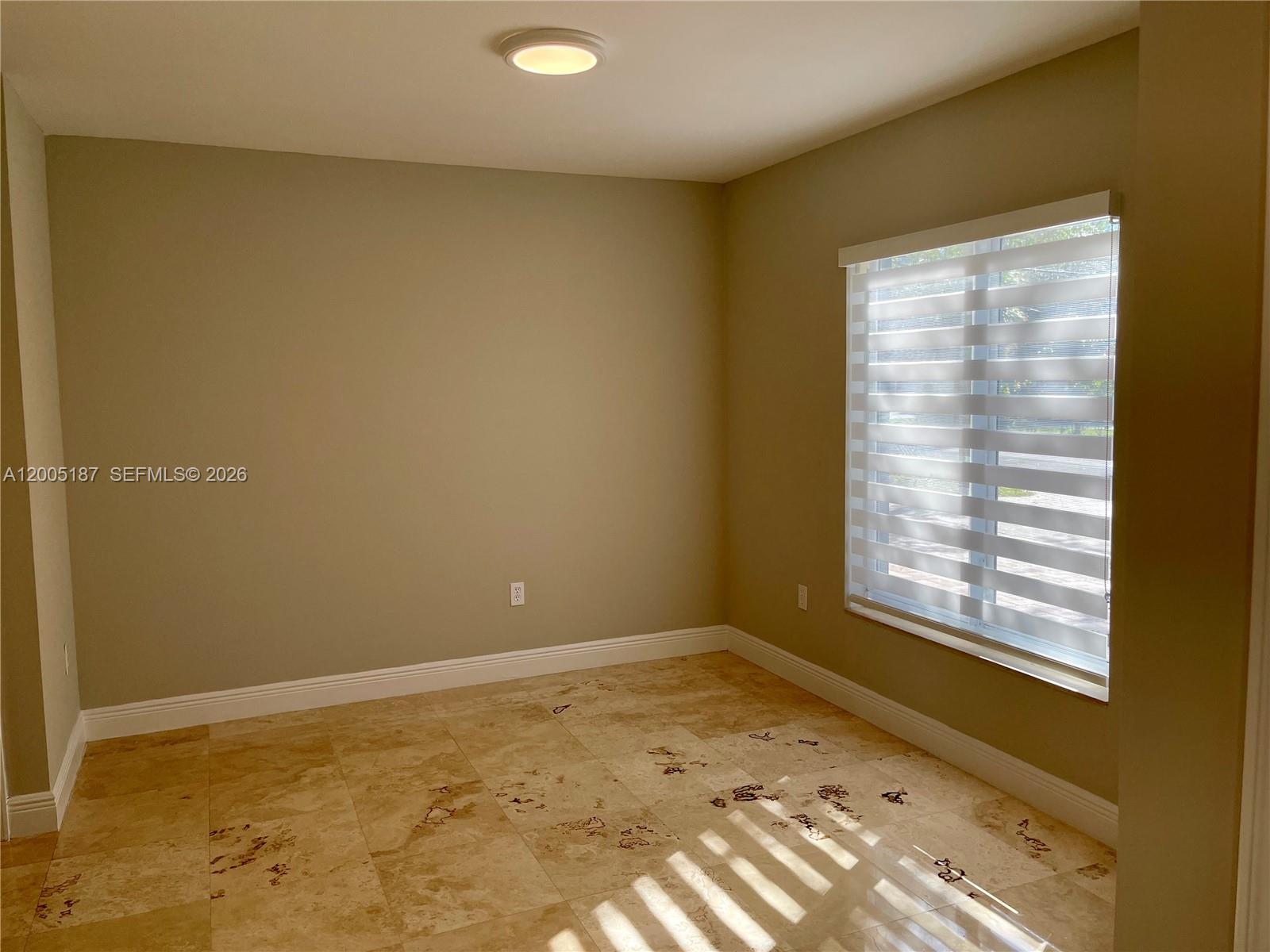 3191 Ohio Street Miami, FL 33133 - Photo 5 of 32 a view of a room with a window