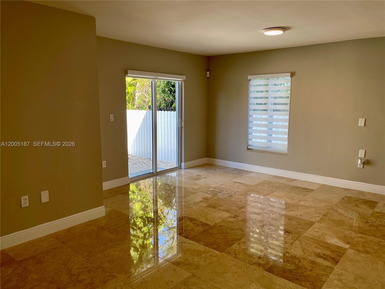 3191 Ohio Street Miami, FL 33133 - Photo 8 of 32 a view of an empty room with a window