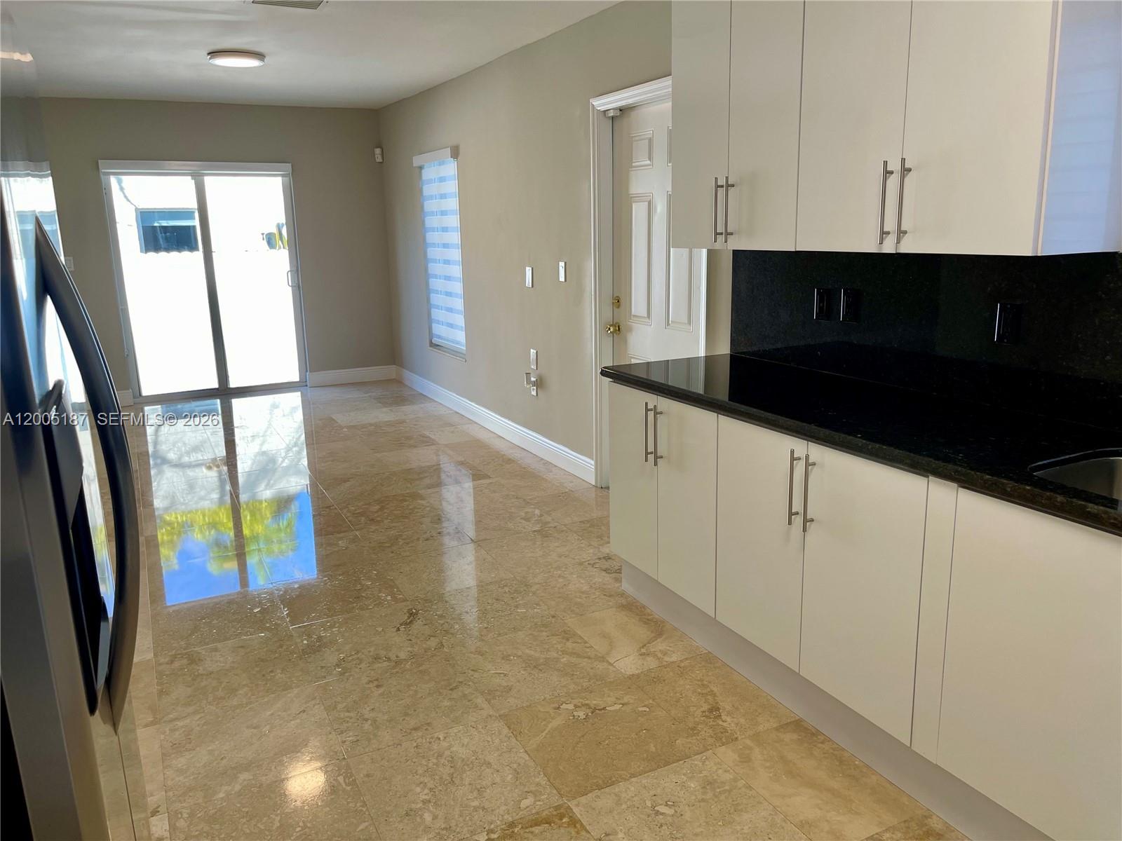 3191 Ohio Street Miami, FL 33133 - Photo 9 of 32 a view of an entryway with wooden floor