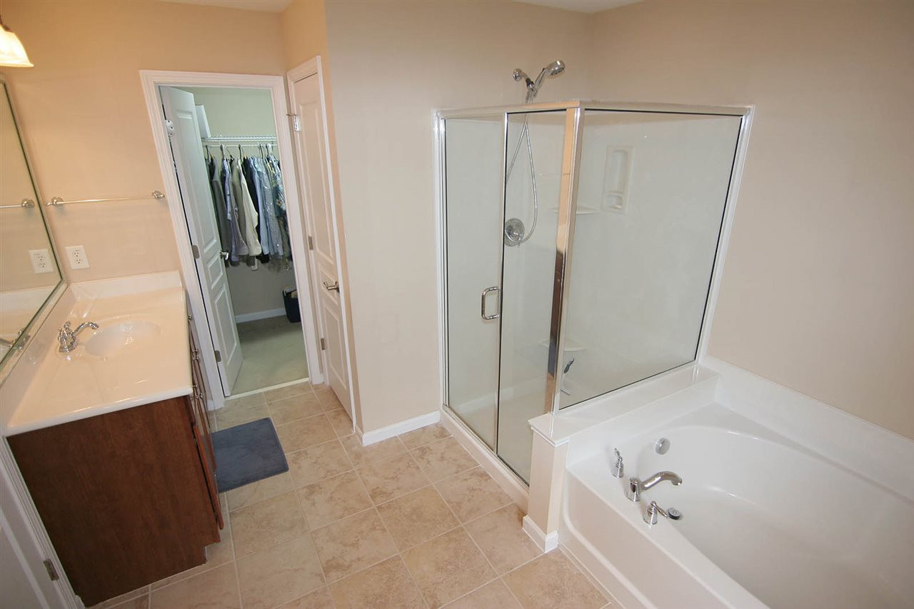 2723 Kinsley Place Raleigh, NC 27616 - Photo 18 of 25 Mas. tub and sep shower