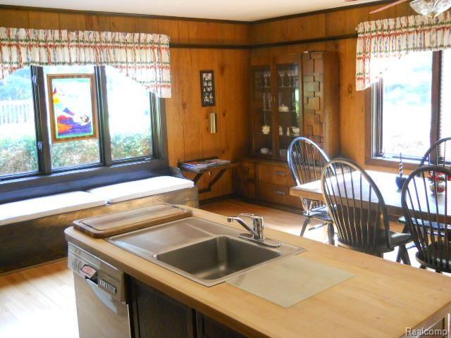 2828 Chilson Road Howell, MI 48843 - Photo 38 of 79 kitchen island & nook